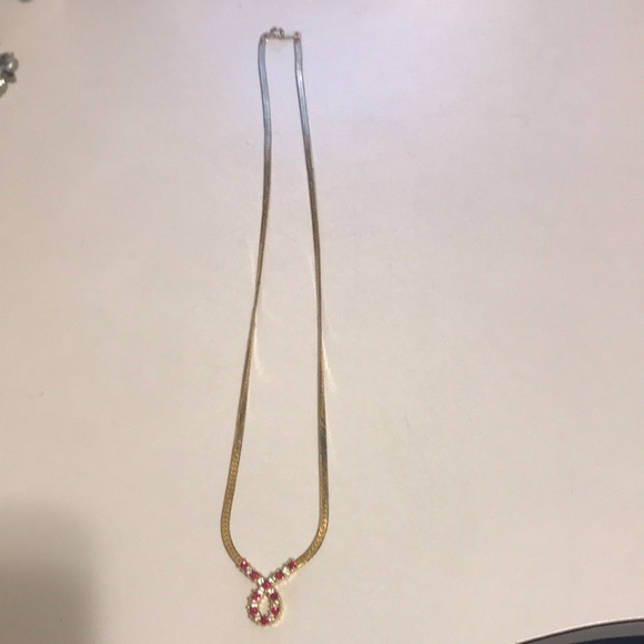 Avon Jewelry - Avon Gold-Tone Necklace with Red Stone Pendant